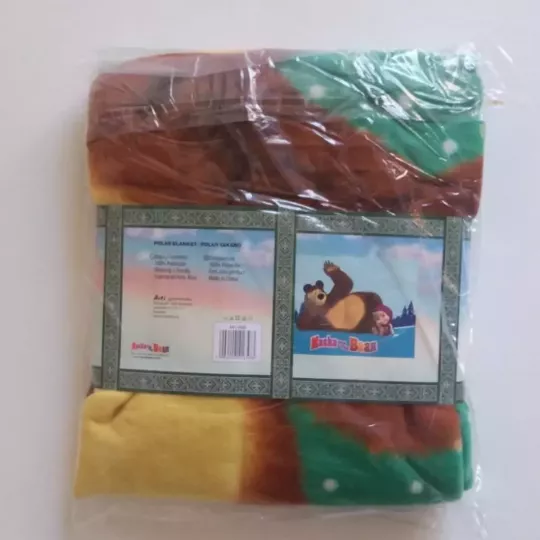 Plaid Petite Couverture Polaire MASHA & MISHKA Fond Vert et Bleu  Emballage